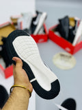 Nke air zoom gauid 10 runners black white