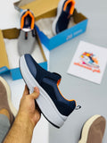Skechars mark (blue)
