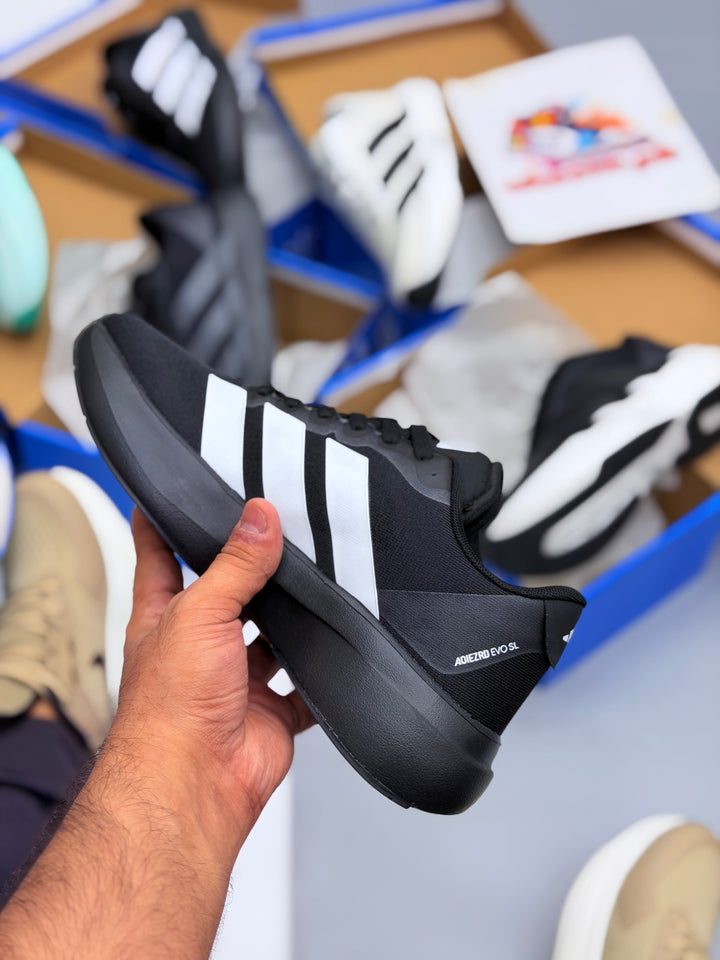 ADIZERO EVO SL SHOES fubl/wstrip
