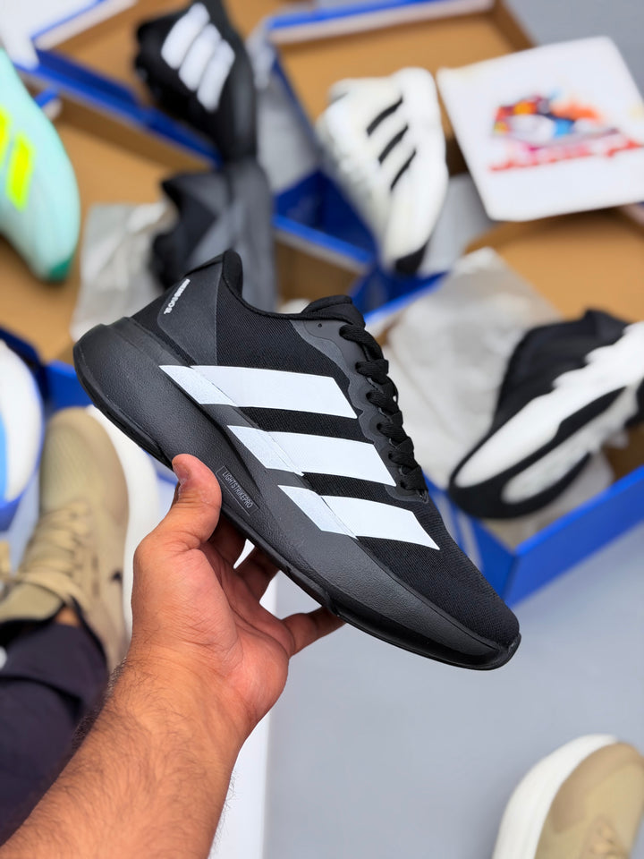 ADIZERO EVO SL SHOES fubl/wstrip